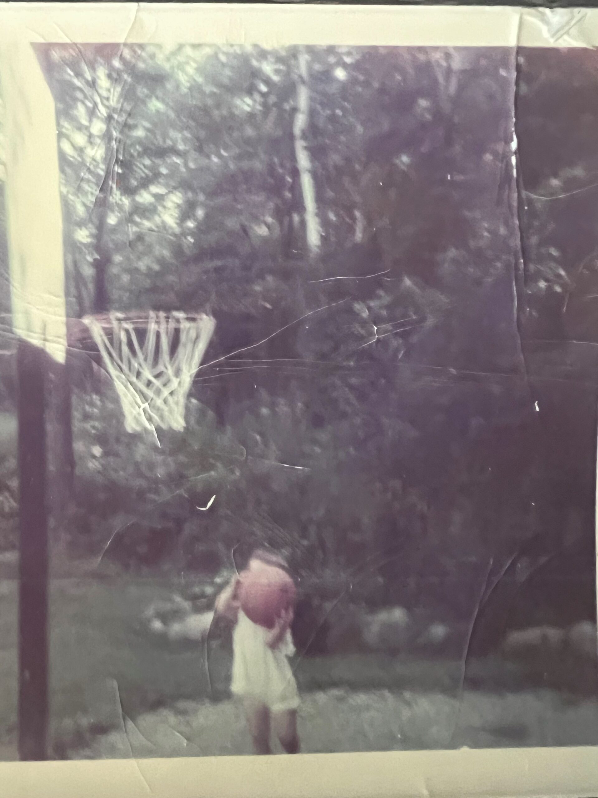 Beth at the backyard hoop